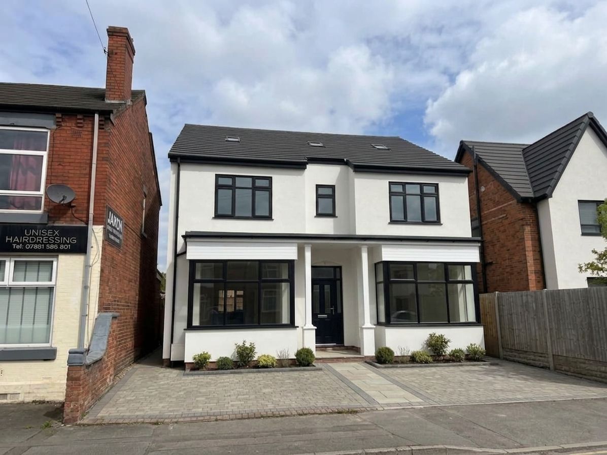 Renovated house with new render, windows and front driveway