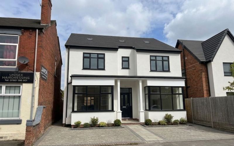 Converted residential property with new facade and landscaping